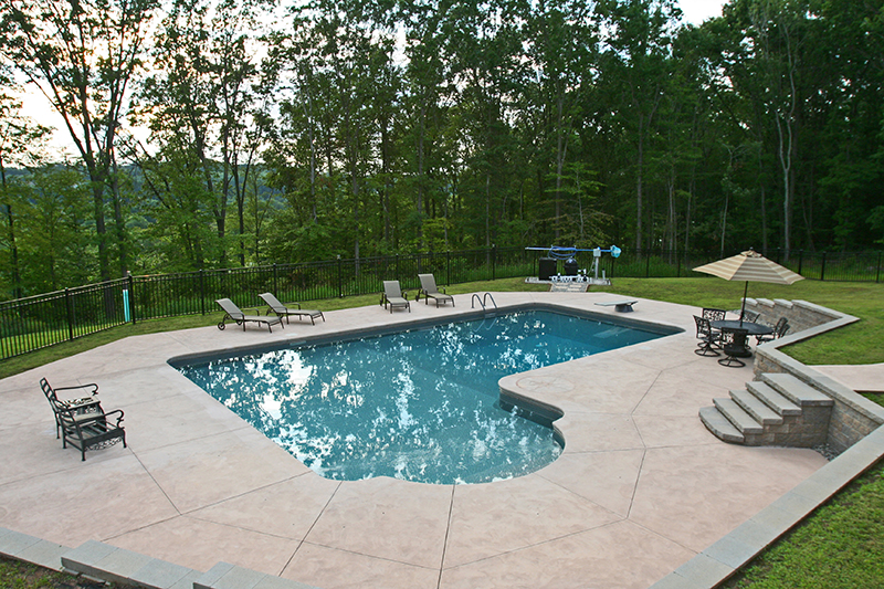 Swimming pool and stamped concrete project example 197